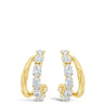Gold hoop earrings with small diamonds on a white background