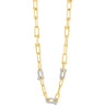 Gold chain necklace with diamond accents on a white background