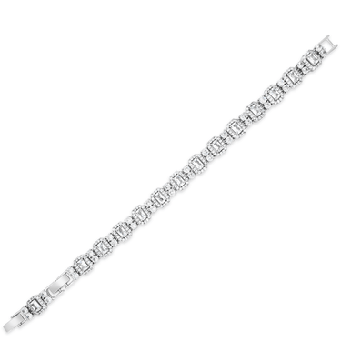 Silver bracelet with clear stones on a white background