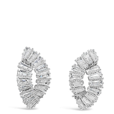 Gold earrings with a circular design on a white background