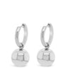 Pair of silver hoop earrings with round ball charms on a white background
