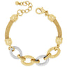A gold-tone chain bracelet with a mesh band, decorative shield charms, and alternating gold and silver-tone oval links, displayed on a clean white background.
