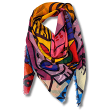 Colorful abstract patterned scarf on a white background