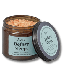 Aery Before Sleep bath salts jar with open lid on a white background