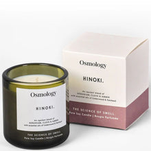Osmology Hinoki candle with packaging on a white background