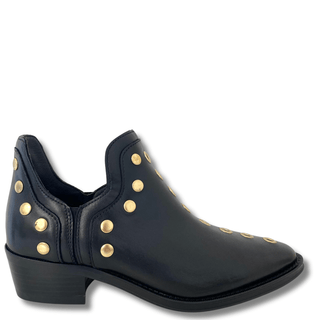 Black boot with gold studs on a white background