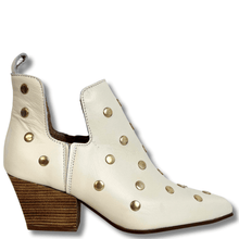 ladies off white leather boots with gold studding and pointed toe