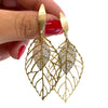 angela-darcy-gold-double-leaf-earrings.jpg