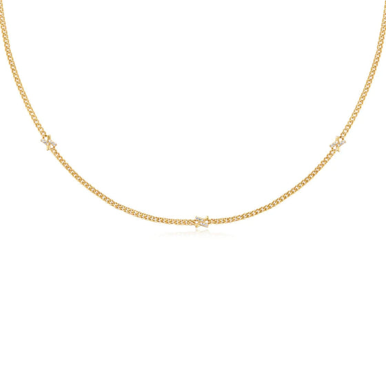 ania-haie-dusk-divas-gold-cross-station-necklace(1).jpg