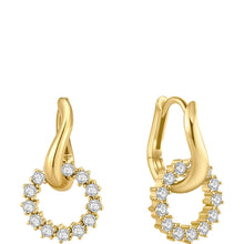 A pair of gold hoop earrings with open circular designs set with small round clear stones, shown on a plain white background.