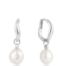 Pair of pearl earrings with silver hooks on a white background