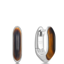 Silver hoop earrings with brown stone inlay on a white background