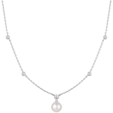 Pearl necklace with small diamonds on a white background