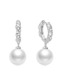 Pearl earrings with silver hooks on a white background