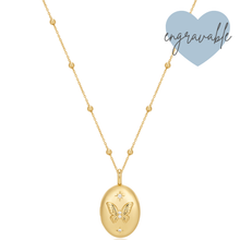 Gold necklace with a butterfly pendant on a white background, featuring the brand 'Engravable'.