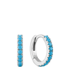 Silver hoop earrings with turquoise stones on a white background