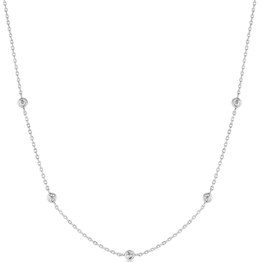 Delicate silver necklace with small round stones on a white background