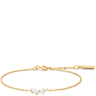 Gold bracelet with pearls on a white background
