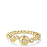 Gold ring with star and diamond design on a white background