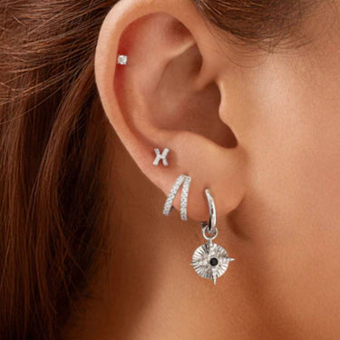 ania-haie-sunshine-chaser-silver-astrolabe-charm-huggie-hoop-earrings.jpg