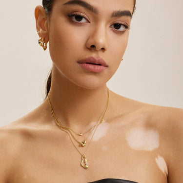 Ania Haie Taking Shape Gold Twisted Wave Hoop Earrings
