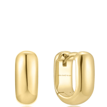 Gold hoop earrings on a white background