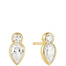 A pair of gold drop earrings with a small round clear gemstone above a larger marquise-cut clear gemstone, shown on a plain white background. One earring is facing forward and the other is angled to show the post and back.