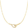 A gold chain necklace featuring a unique interlocking knot and teardrop-shaped pendant pavé-set with small clear stones, shown against a plain white background.