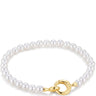 A pearl bracelet with white round pearls and a polished gold clasp, shown on a clean white background.