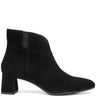 A black suede ankle boot with a block heel and pointed toe, shown in a side profile on a white background.