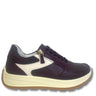 A low-top sneaker shown in a side profile view on a white background. The shoe features dark plum purple leather panels, a contrasting light beige textured side panel, a beige and brown platform sole, and a gold-tone zipper pull.