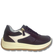 A low-top sneaker shown in a side profile view on a white background. The shoe features dark plum purple leather panels, a contrasting light beige textured side panel, a beige and brown platform sole, and a gold-tone zipper pull.