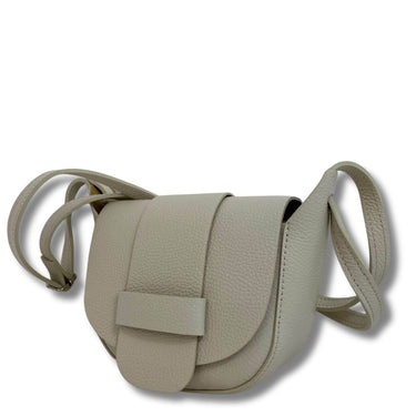 Beige leather handbag with a strap on a white background
