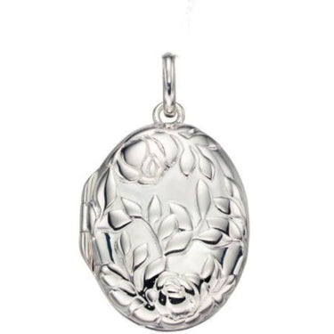Silver locket with floral design on a white background