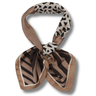 Patterned scarf with animal print and brown tones on a white background