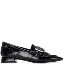 Black patent leather loafer with a decorative buckle on a white background