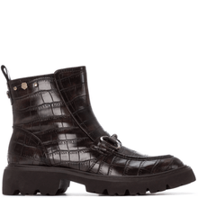 Brown crocodile-patterned boots on a white background