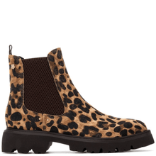 Leopard print boot with a black sole on a white background