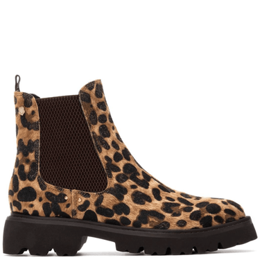 Leopard print boot with a black sole on a white background