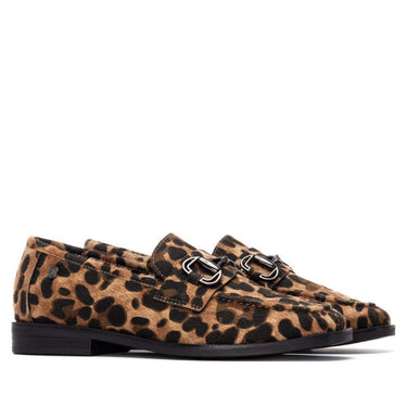 Leopard print loafers with black soles on a white background