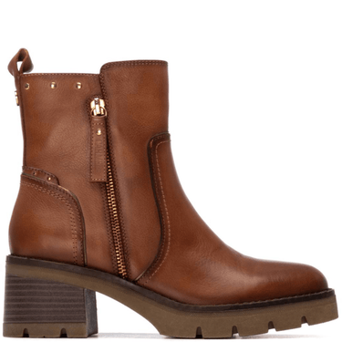Brown leather boots with a zipper on a white background