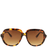 Sunglasses with tortoiseshell frame and brown lenses on a white background