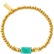 gold beaded bracelet with turquoise bead