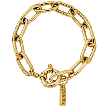 Gold chain bracelet with a tag on a white background