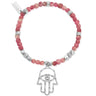 Bracelet with pink beads and silver Hamsa hand charm on a white background