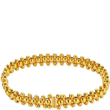 Gold beaded bracelet on a white background