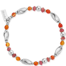 Bracelet with silver and multicolored beads on a white background