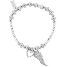 Silver bracelet with heart and wing charm on a white background