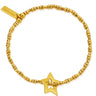 Gold bracelet with star charm on a white background