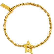 Gold bracelet with star charm on a white background
